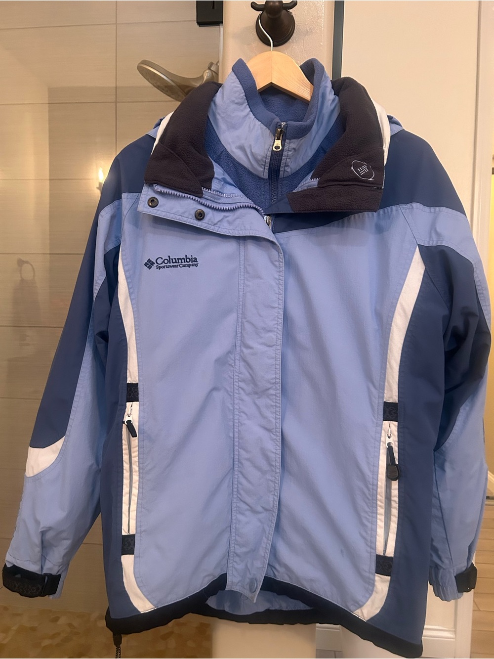 Columbia Light Blue and Navy women’s Waterproof Rain Jacket